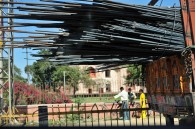 Mess of metal rods out the back of a truck