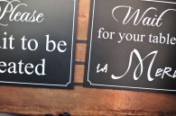 Please wait to be seated