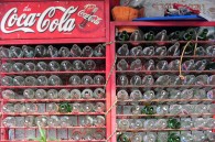 Row of empty Coke bottles