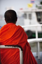 Monk on a boat
