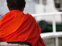 Monk on a boat